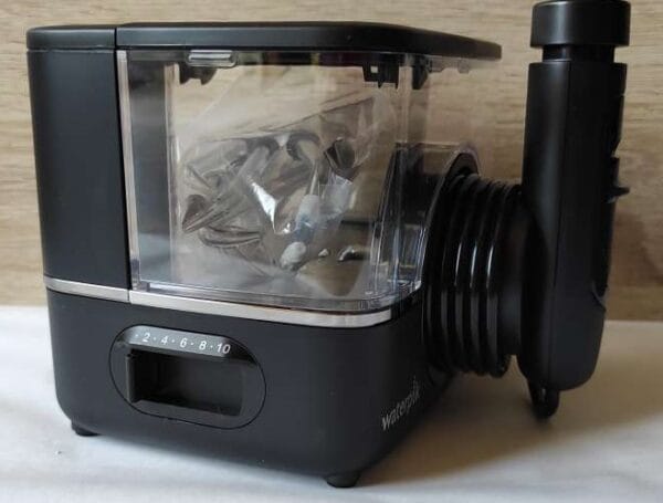 Irrigador bucal portátil Waterpik ION Professional WF12, para viajes y hogar (PRETA) - Imagen 3